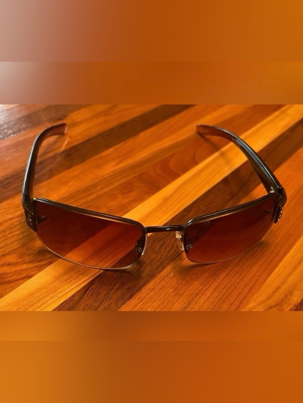 Stylish Relic Sunwear Sunglasses with brown lenses.